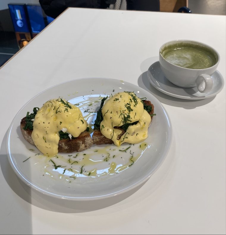 Eggs benedict on a white plate
