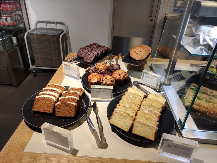 Brownies, flapjacks and lemon slices on dark plates